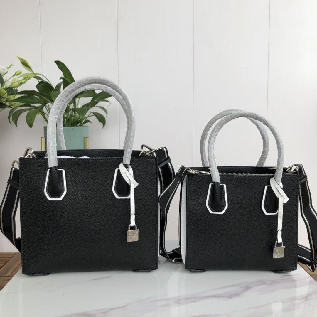 Streamlined Tasker - Women handbag - color black - size medium and large - side view